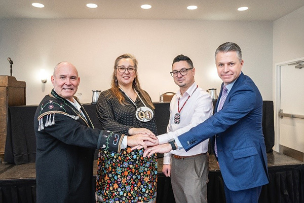 From left to right: Pierre Picard, Grand Chief of the Wendat Nation, Mandy Gull-Masty, in her former role as Grand Chief of Eeyou Istchee, Fred Vicaire, President and CEO of Mi'gmawei Mawiomi Business Corporation, and James Wolfe, Vice President, Asset Management